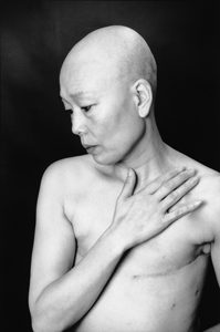 Bald, breast-less transgender boudoir photograph-trix rosen photograph